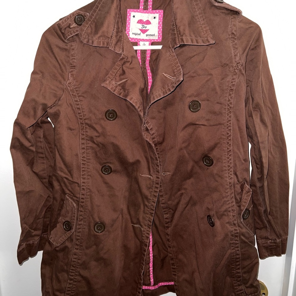 Girls size 10 gap peacoat. In great shape! Pink polka dot design inside.